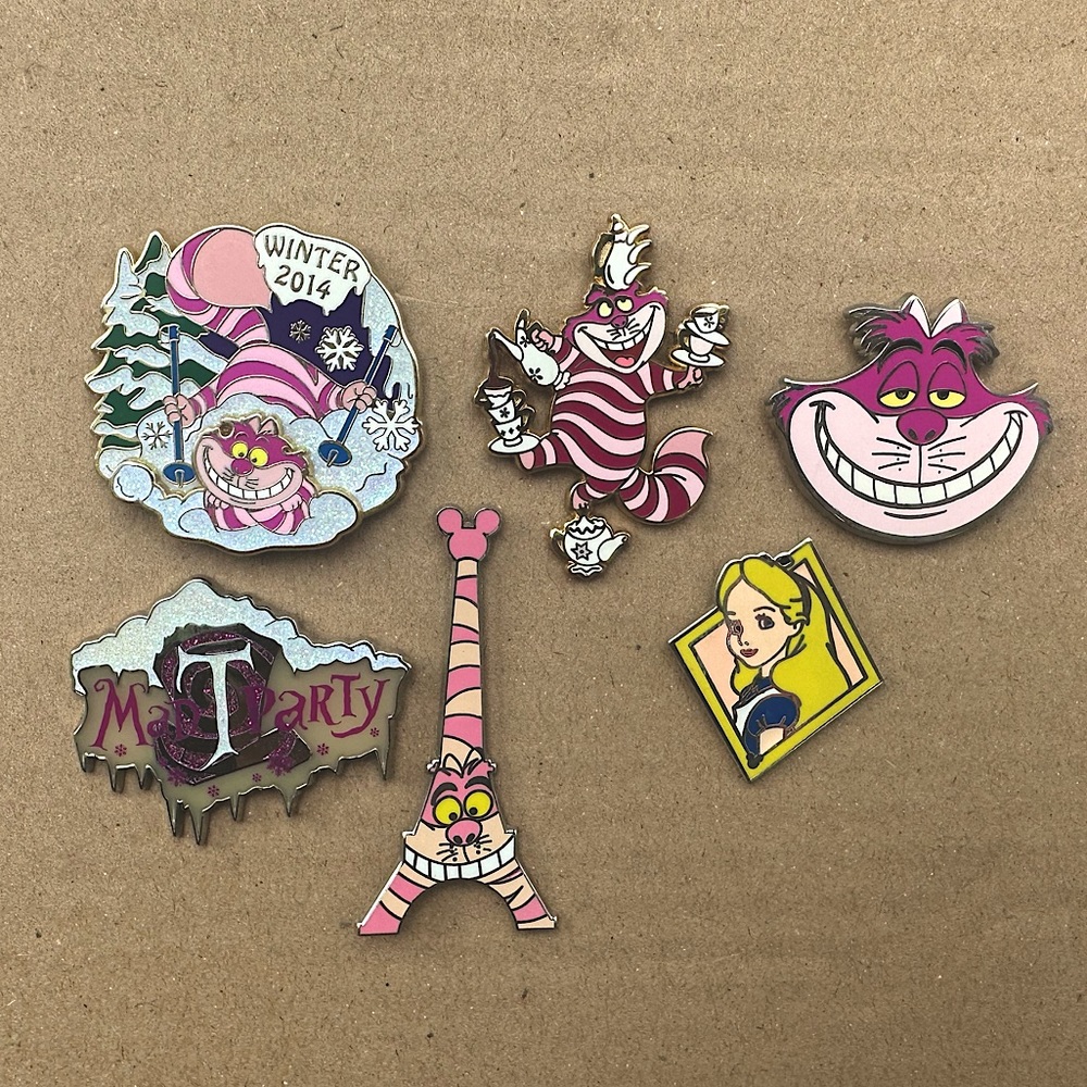 Lot of  authentic Alice in Wonderland Disneyland pins, Cheshire Cat and Alice